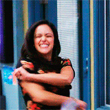 very happy woman showing her excitement with her body
