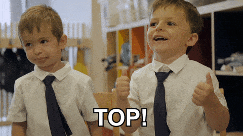 Kids with thumbs up.