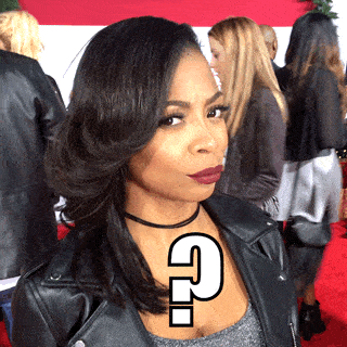 A woman with a quizzical expression.