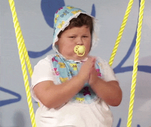 A baby applauding.