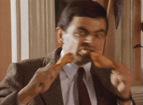 A man eats with an appetite.