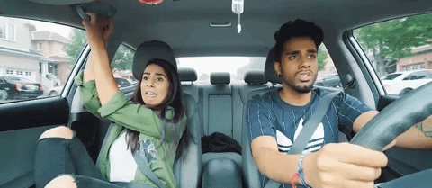 A woman is scared by a man's driving.