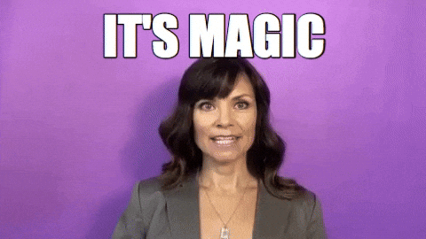 A woman waves a wand and says, "It's magic."