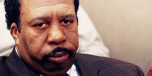 A man blinking his eyes.